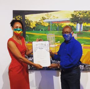 Melissa Aytenfisu and Mayor Sylvester Turner at her "Metamorphosis" exhibition.