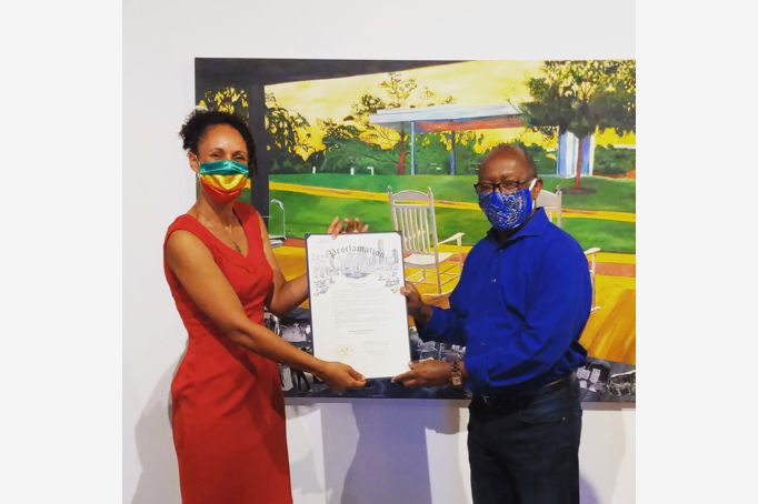 Melissa Aytenfisu and Mayor Sylvester Turner at her "Metamorphosis" exhibition.